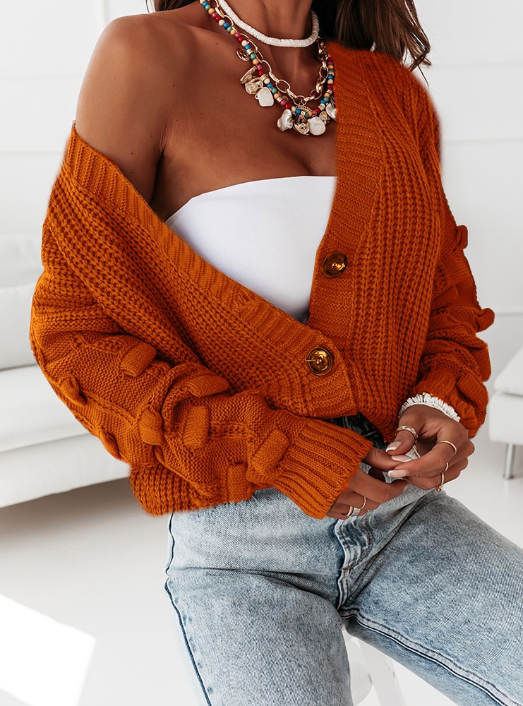 Pomarańczowy sweterek z ozdobnymi...