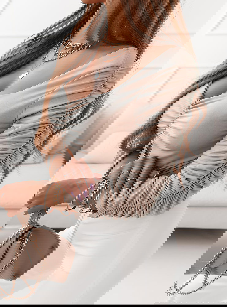 Beżowa bluzka z ozdobnymi...