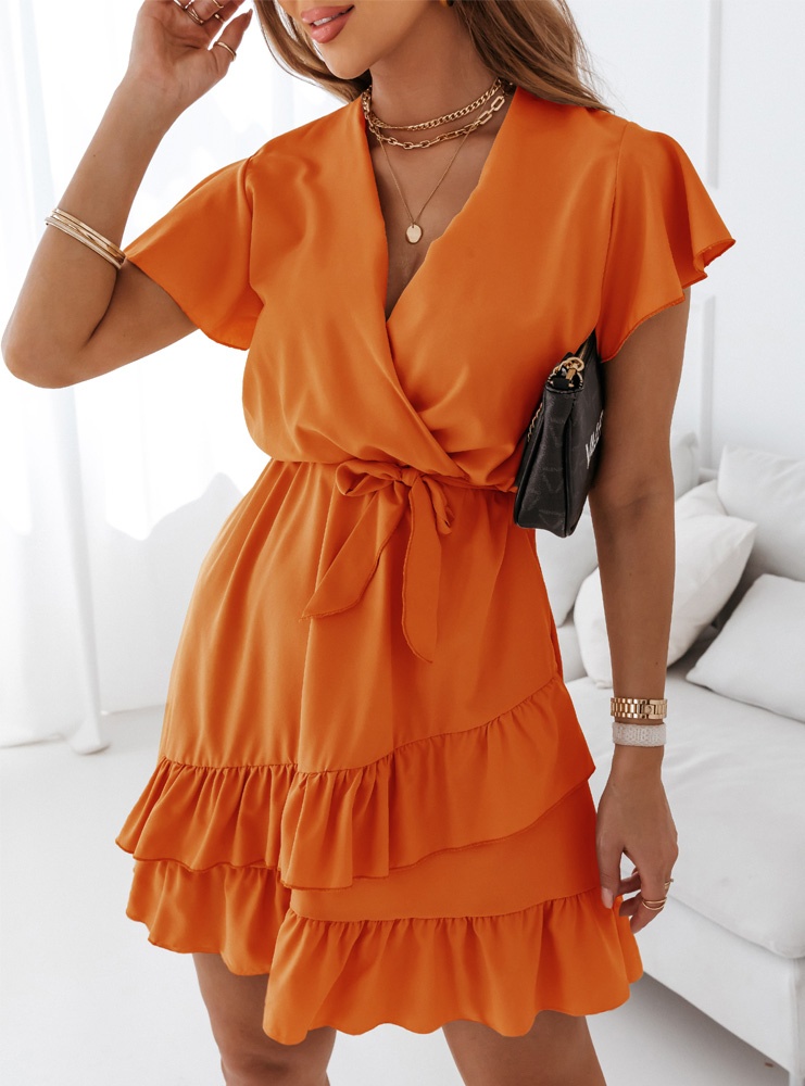 Pomarańczowa sukienka z falbankami...