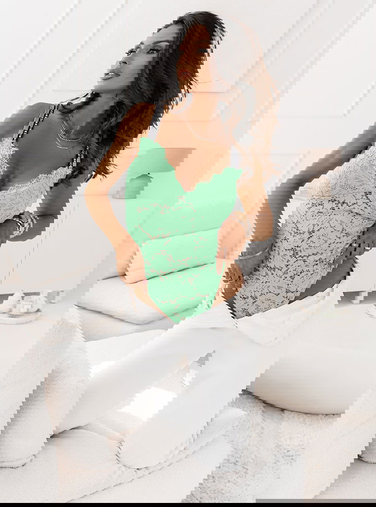 Miętowe koronkowe body z ozdobnymi...