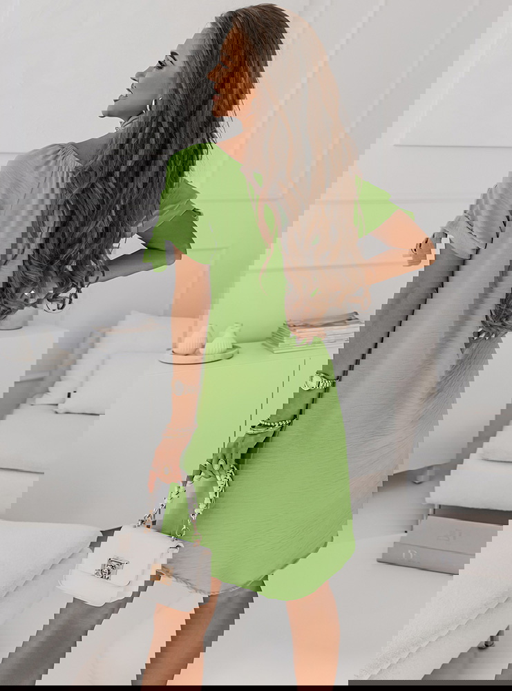 Zielona sukienka z dekoltem i...