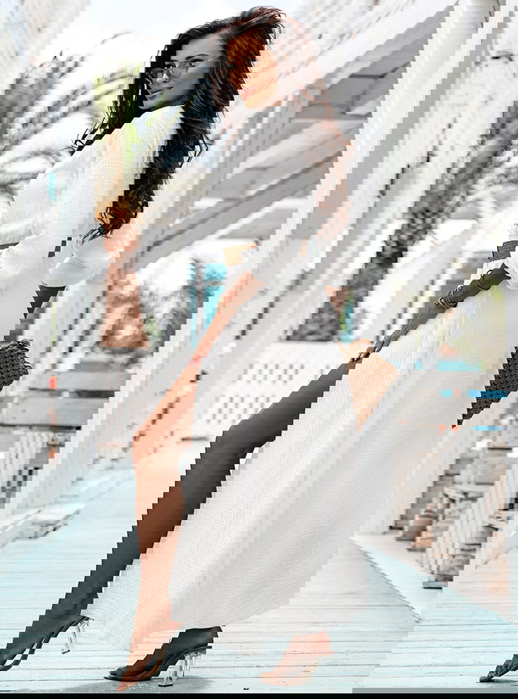 Biała muślinowa sukienka z...