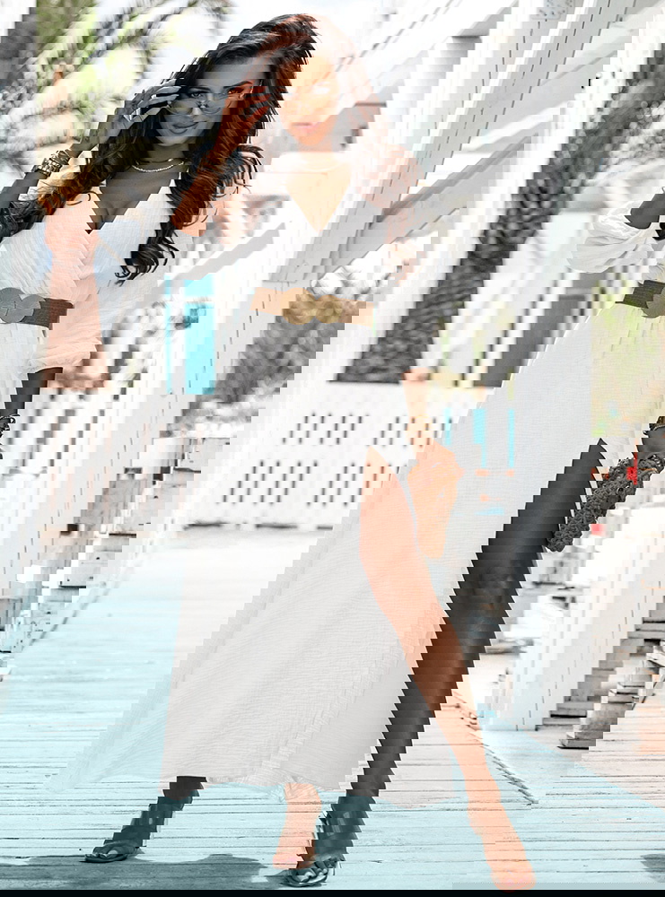 Biała muślinowa sukienka z...