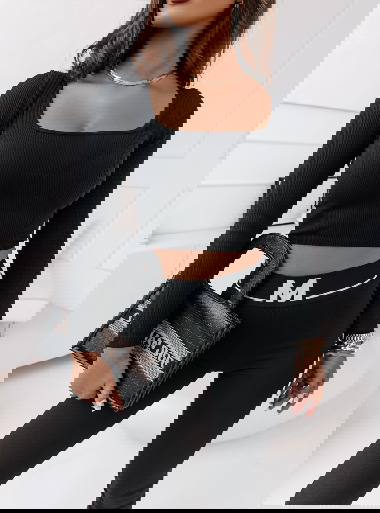 Czarne prążkowane legginsy z gumą w...