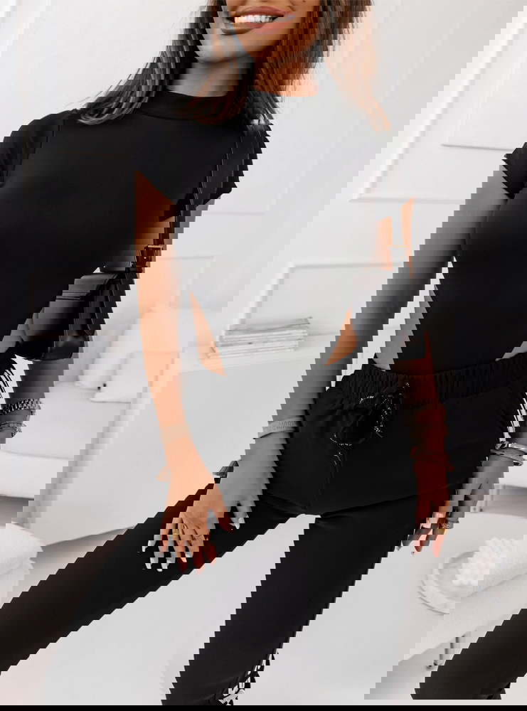 Czarne spodnie dresowe z napisem Choleyy