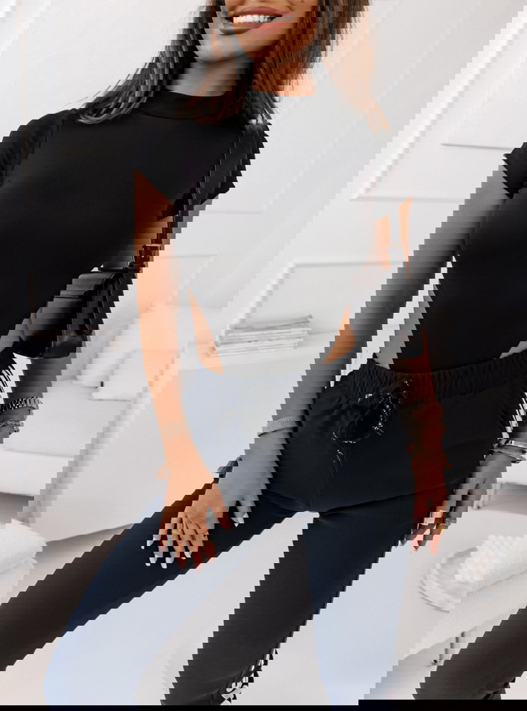 Granatowe spodnie dresowe z napisem...