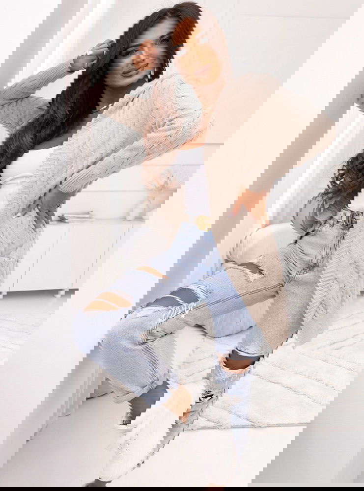 Beżowy pleciony kardigan z kapturem...