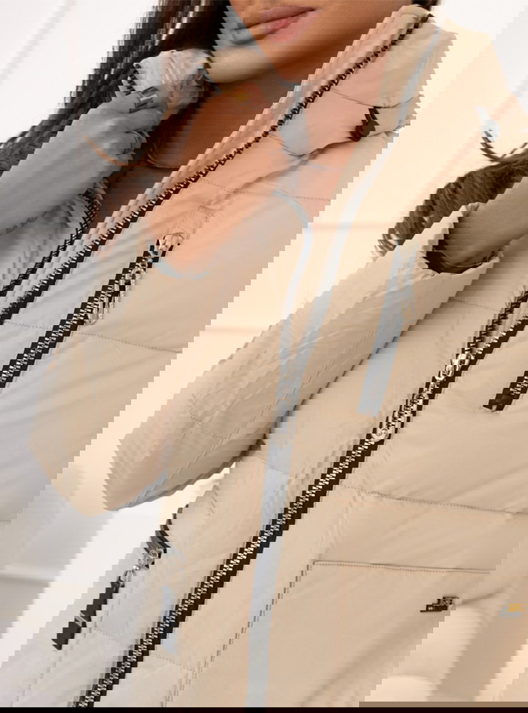 Beżowa pikowana kurtka z kieszeniami...