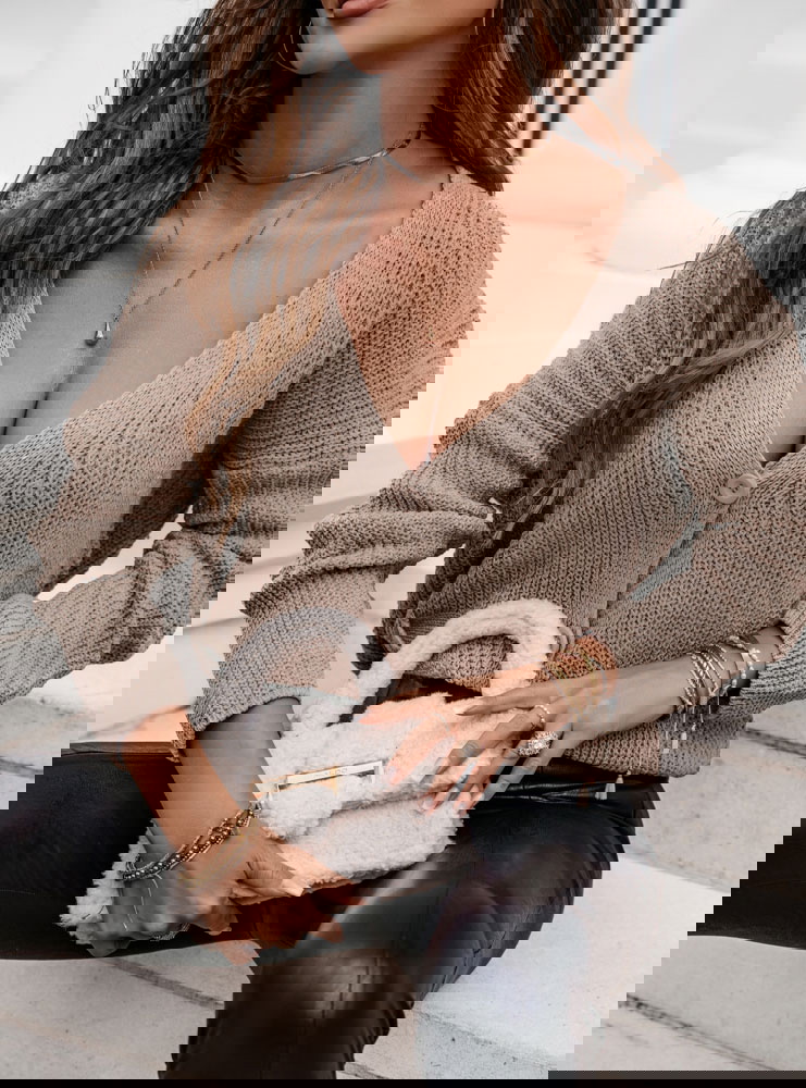 Sweter ażurkowy zapinany na guziki...