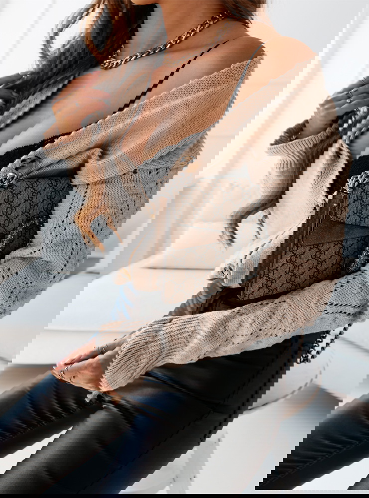 Beżowy sweter zapinany na guziki z...