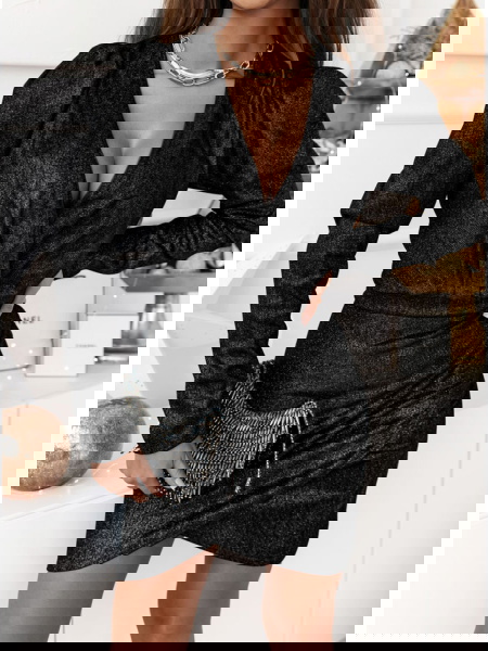 Czarna błyszcząca sukienka... 2