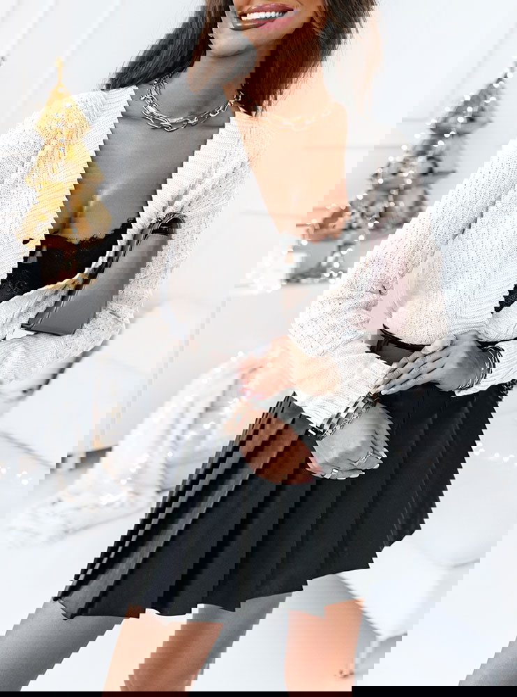 Rozpinany sweter z ozdobnym splotem...