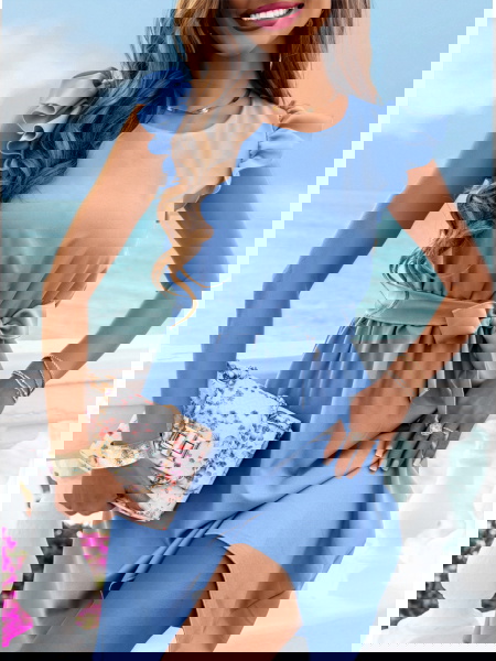 Błękitna sukienka z... 2