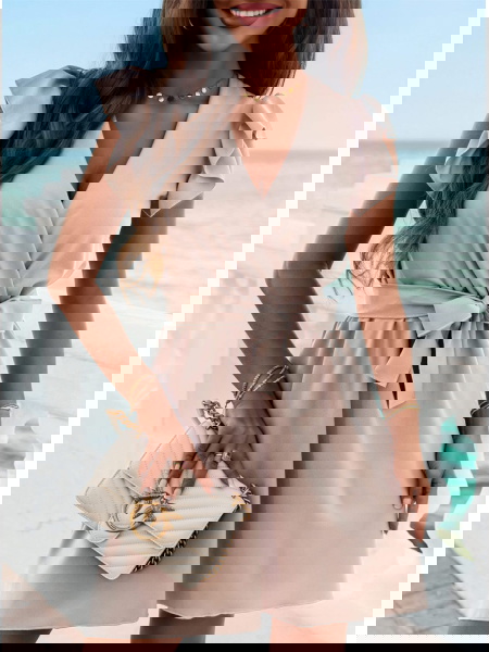 Beżowa sukienka z wiązaniem... 2