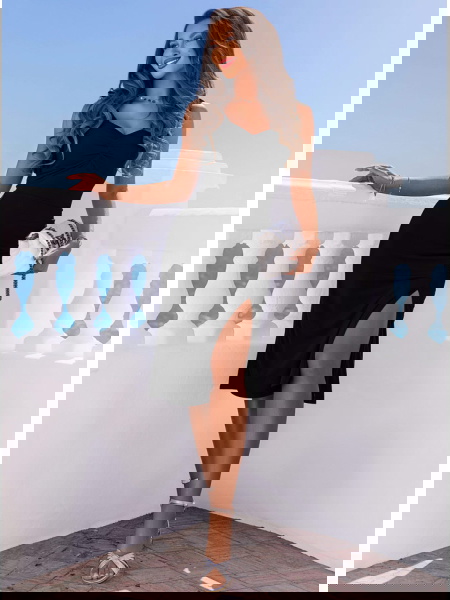 Czarna sukienka midi z... 2