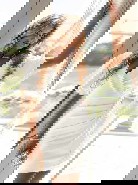 Biała sukienka z... 2