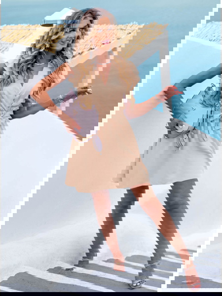 Beżowa sukienka z wiązaniem... 2