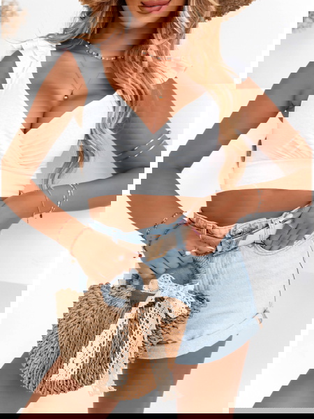 Biały top z falbankami na... 2