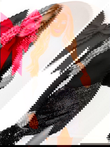 Czarna cekinowa spódniczka... 2