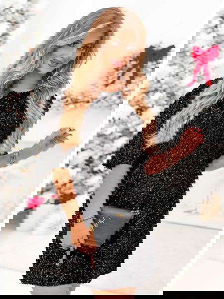 Czarna cekinowa sukienka... 2