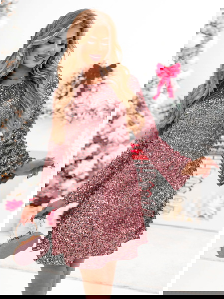 Cekinowa sukienka z kokardą... 2