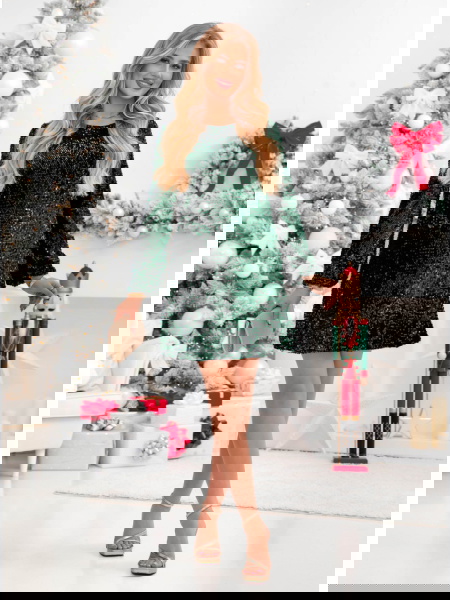 Cekinowa sukienka z kokardą... 2