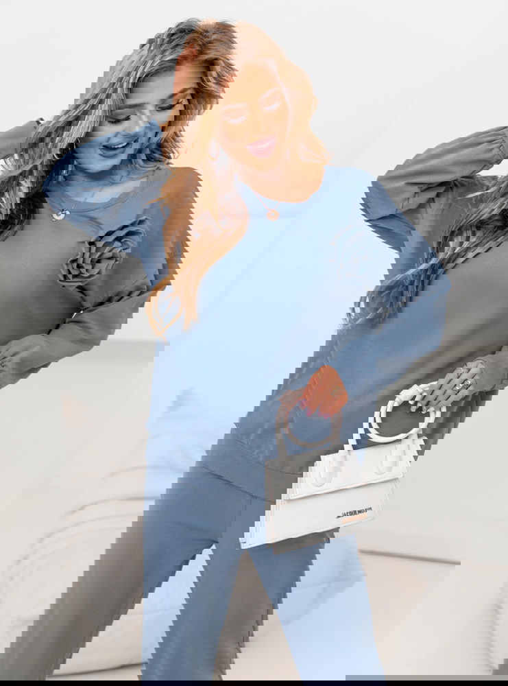 Niebieski komplet z ozdobną różą Elivia