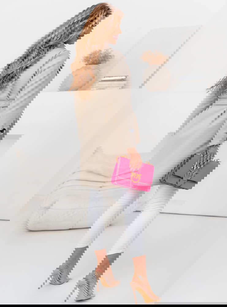 Beżowy płaszcz zapinany na guzik z...