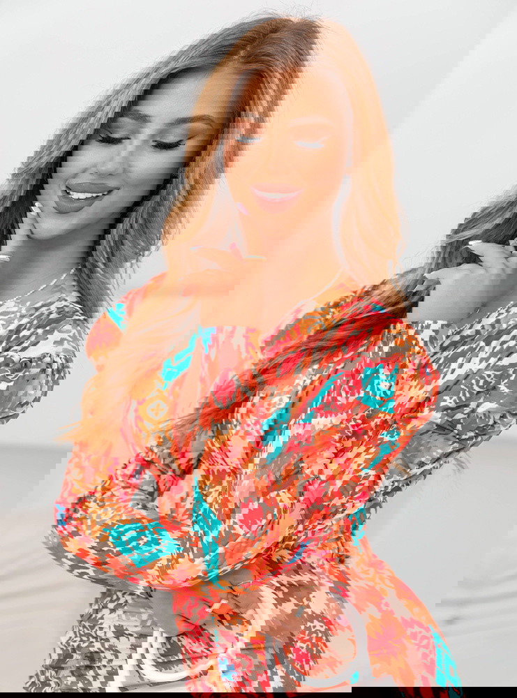 Wzorzysta dopasowana sukienka z...