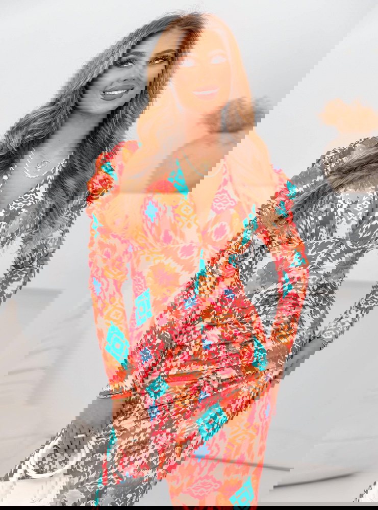 Wzorzysta dopasowana sukienka z...