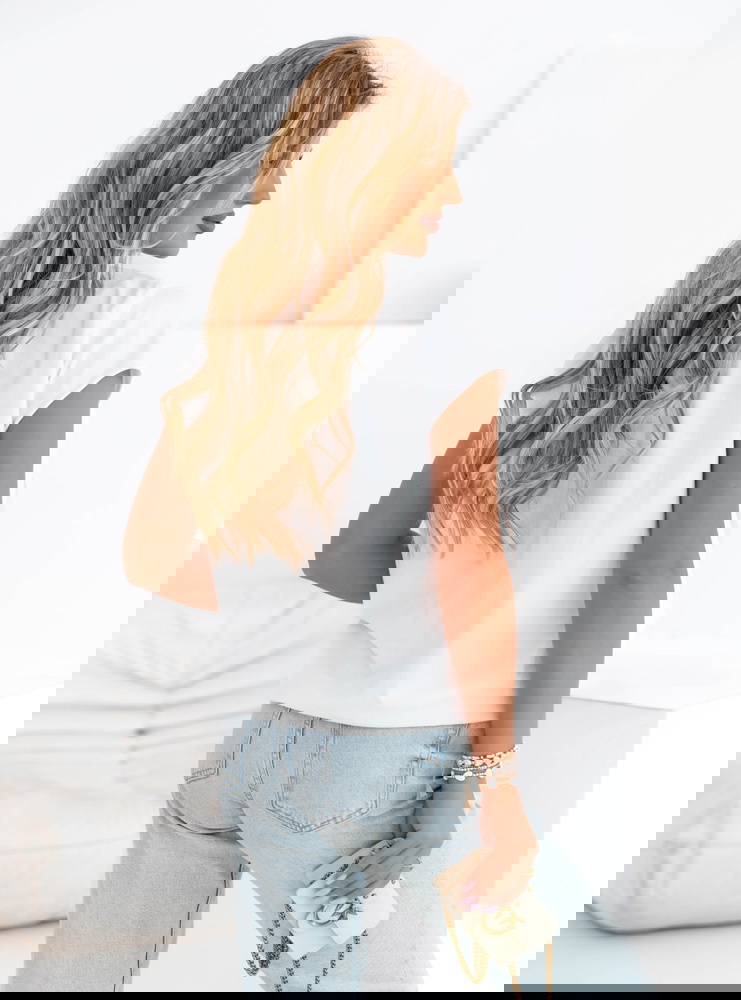 Biała bluzka z beżowym nadrukiem Veralla