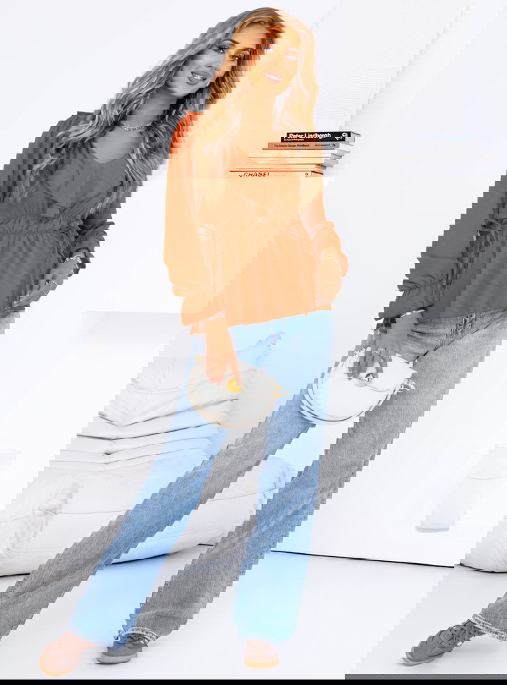 Pomarańczowa bluzka z żabotem Kaminna