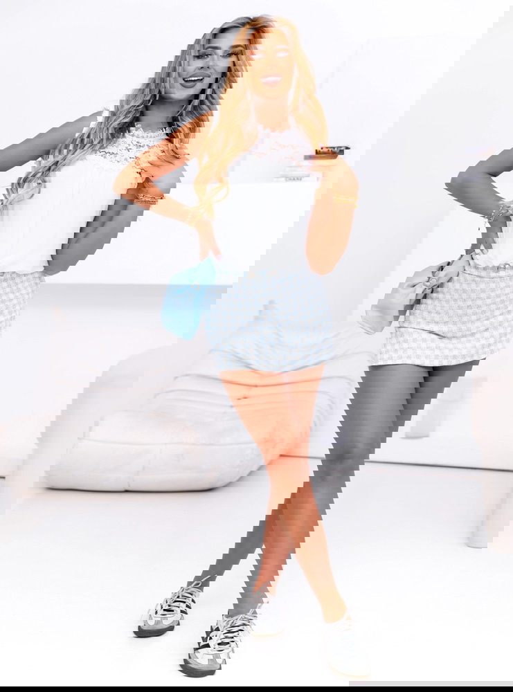 Biała bluzka z koronką Rizza