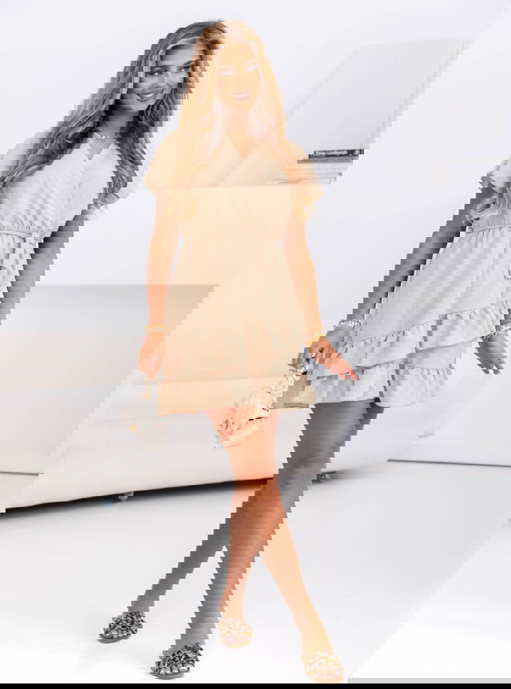 Beżowa sukienka mini z falbanami Novisar