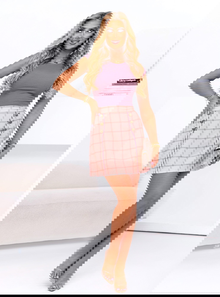 Pudrowa spódniczka w kratę z...