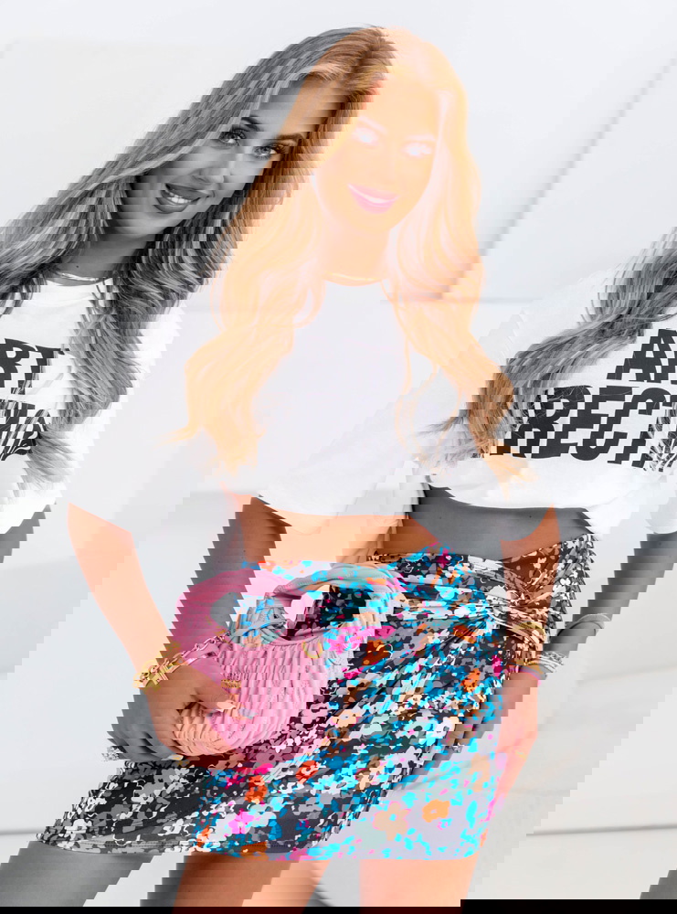 Dopasowana spódniczka mini w kwiaty...