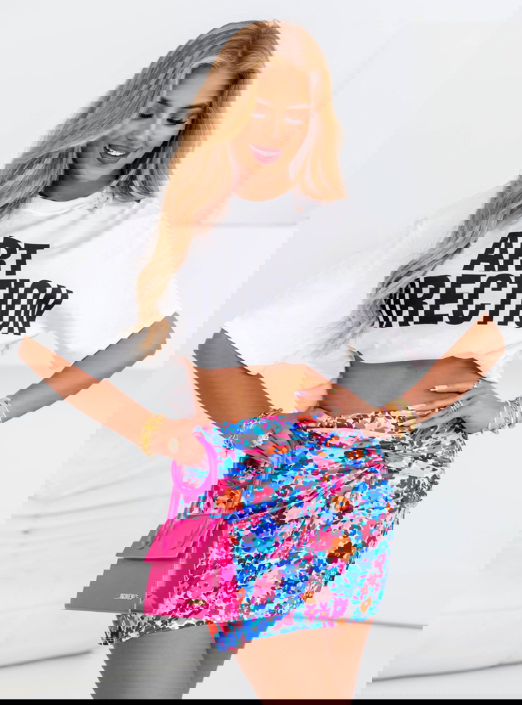 Dopasowana spódniczka mini w kwiaty...