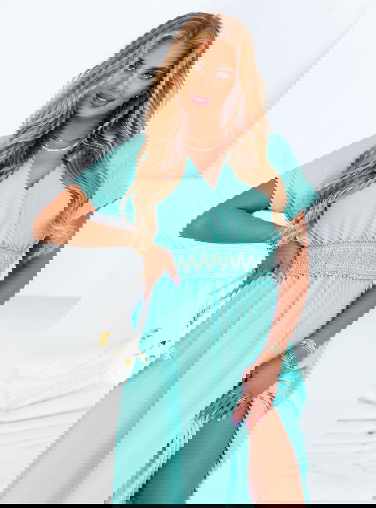 Miętowa długa sukienka z przekładanym...