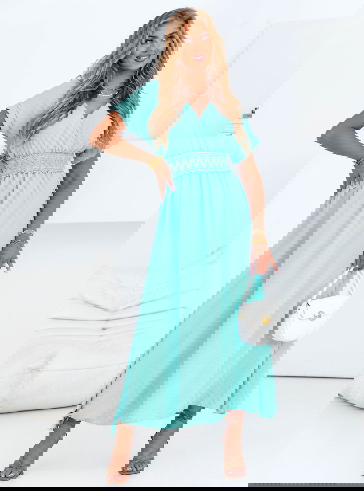 Miętowa długa sukienka z przekładanym...