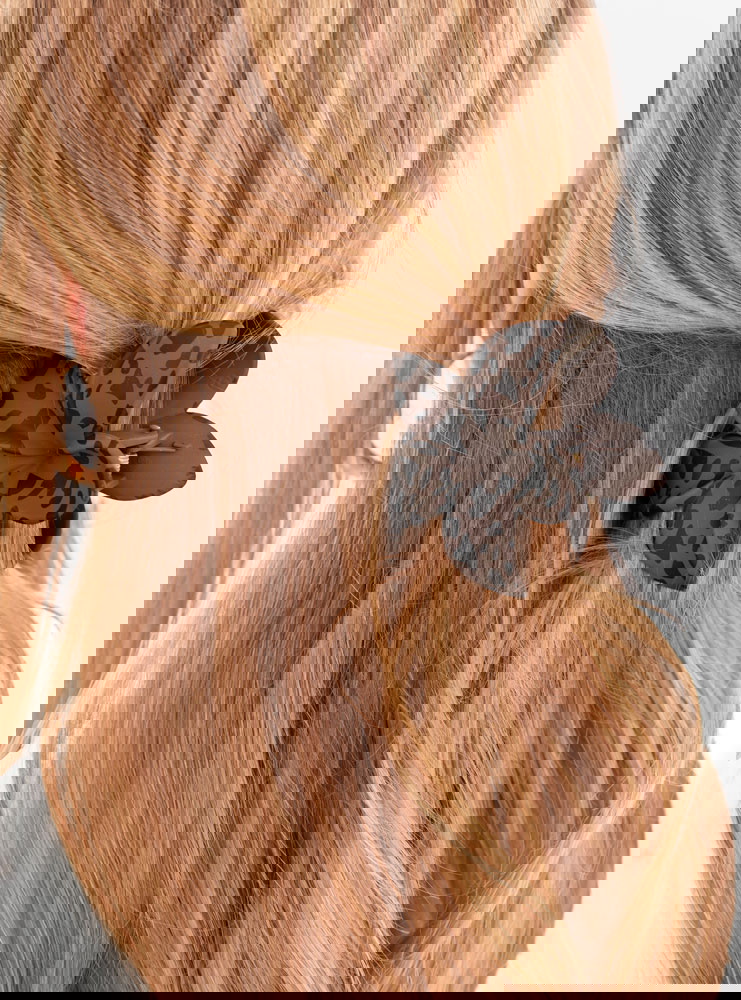 Klamra do włosów w kształcie kwiatka...