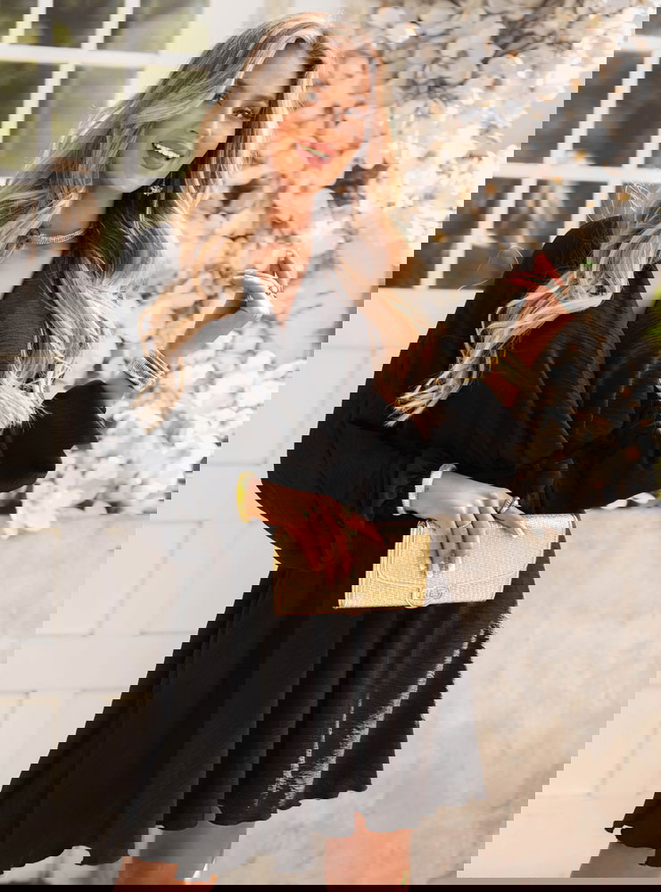 Czarna sukienka mini z przekładanym...