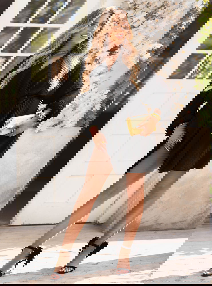 Czarna sukienka mini z przekładanym...