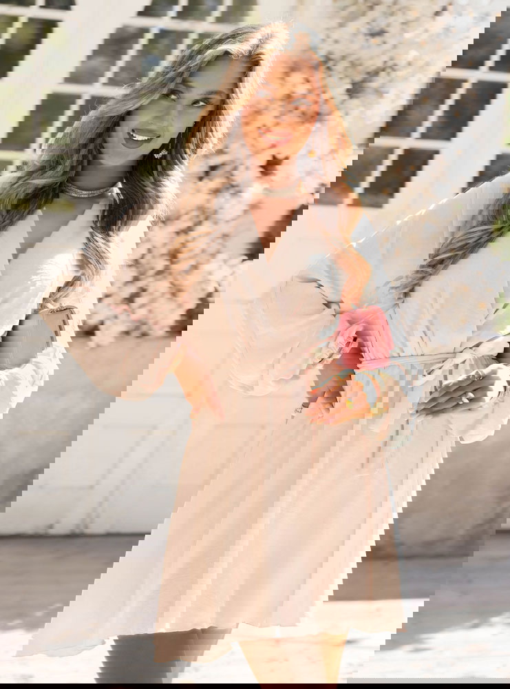 Beżowa sukienka mini z przekładanym...