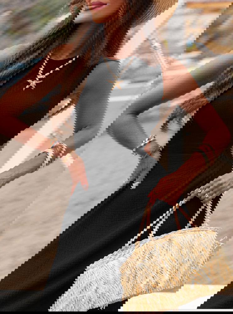 Czarna muślinowa sukienka z odkrytymi...