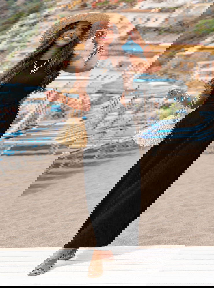 Czarna muślinowa sukienka z odkrytymi...