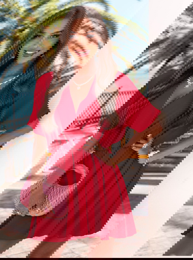 Malinowy kombinezon jak sukienka z...