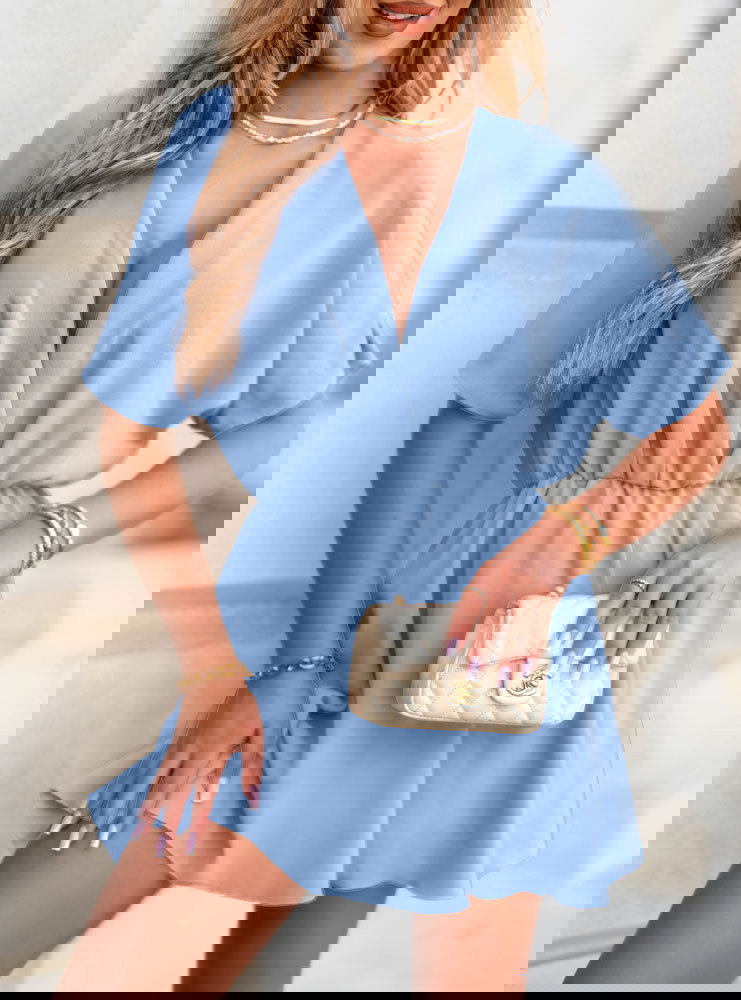 Błękitny kombinezon jak sukienka z...