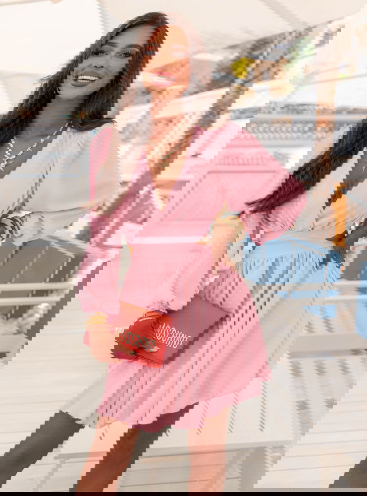 Pudrowa sukienka rozkloszowana z...