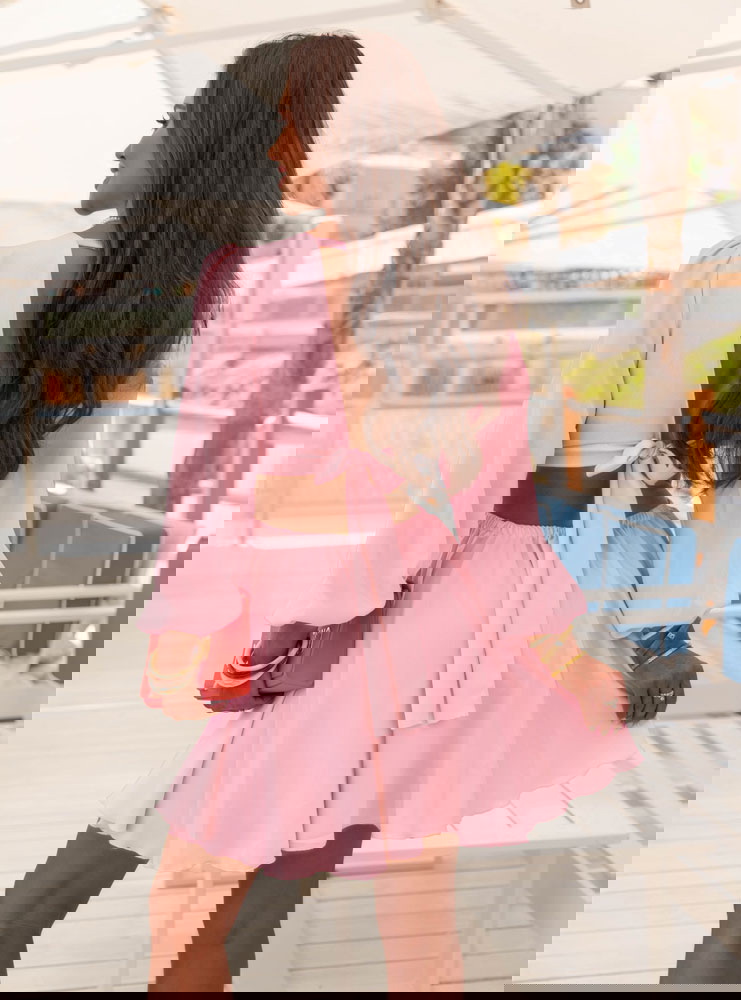 Pudrowa sukienka rozkloszowana z...