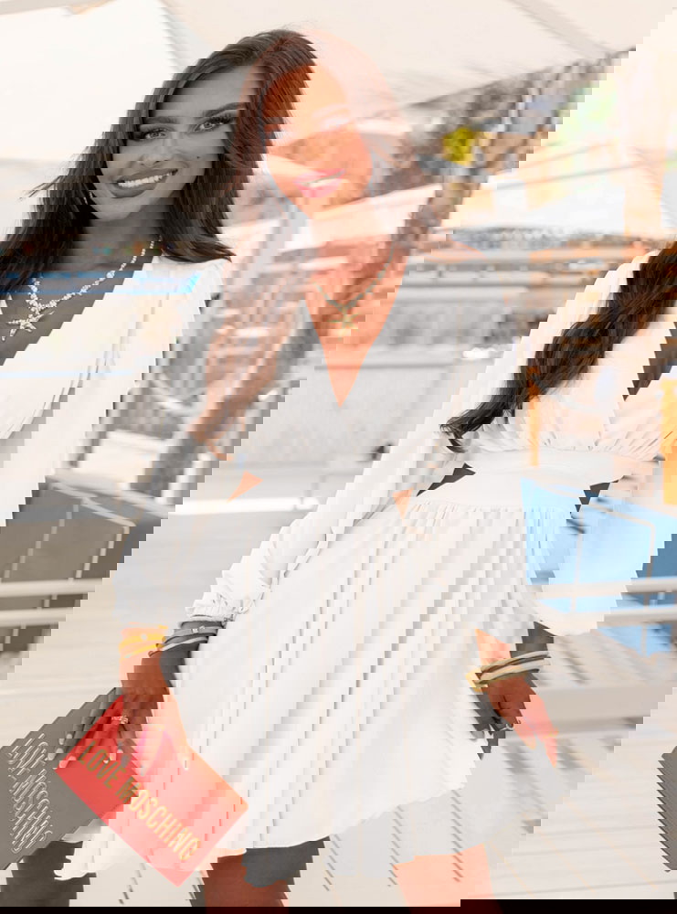 Biała sukienka rozkloszowana z...